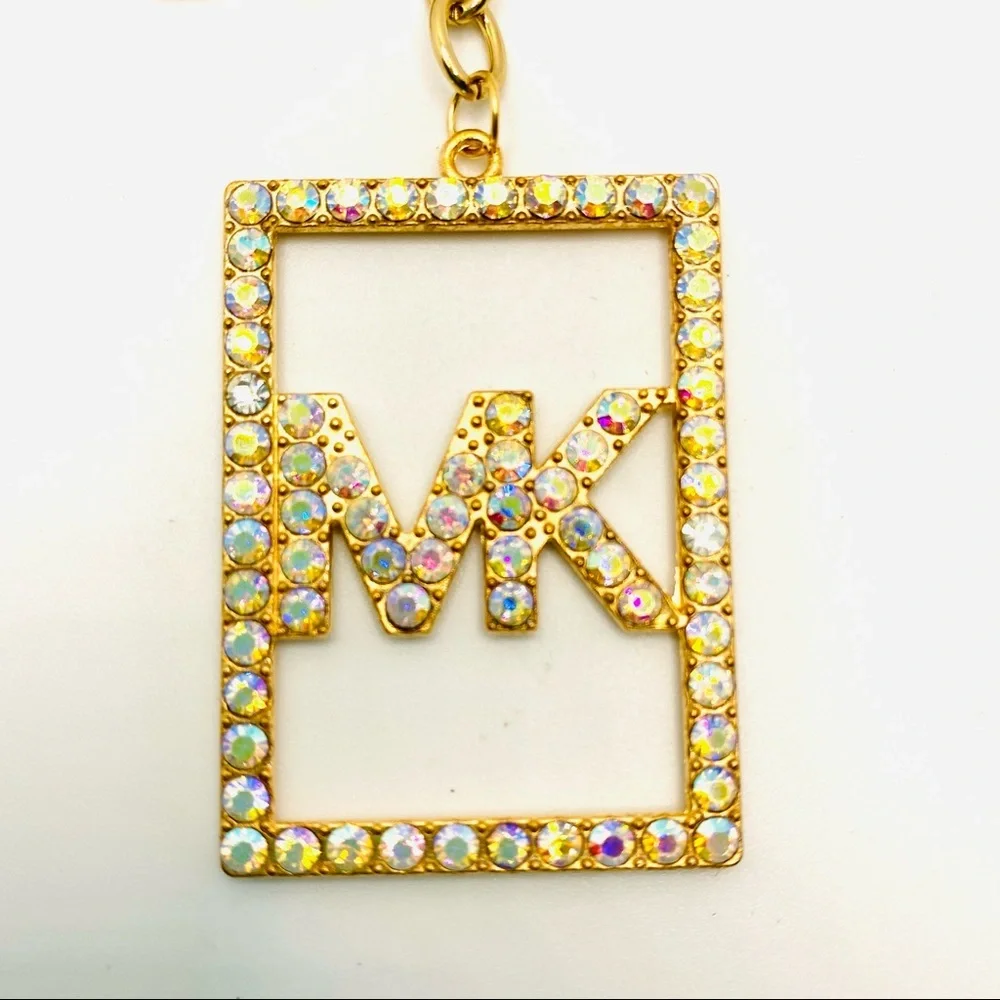 Purse Charm Key Chain MK in Iridescent Crystals set in golden tone. BRAND NEW